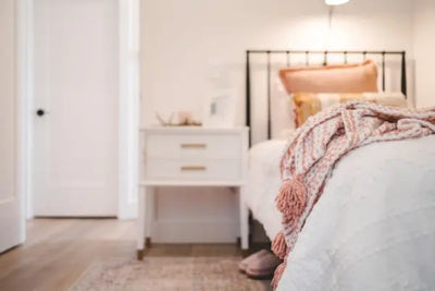 Pillows, bedding, sheets and throw rugs that were all made in America present the bedroom with elegance and craftmanship. 