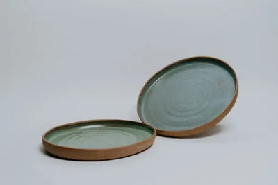Two decorative trays on the floor.