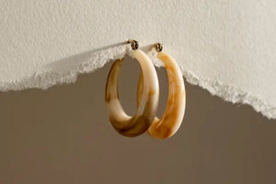 Two hoop earrings.