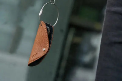 A tan leather key case that was made in America.