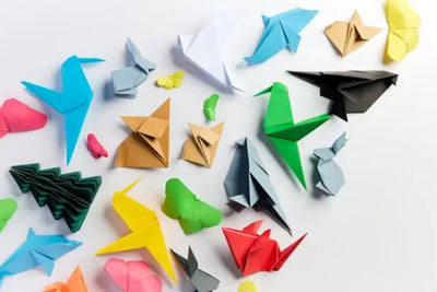 Papercraft birds and plants.