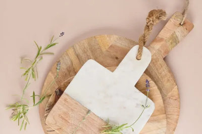 Three wooden trays sitting on top of each other.