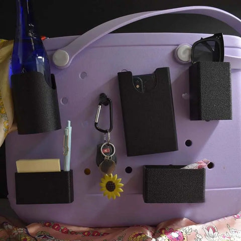 The BAGLETS Ultimate Bundle by Chatelet Manufacturing features black organizers for phones, keys, wallets, bottles, and sunglasses for Bogg Bags & other totes. Also includes a Carabiner Key Holder and fits accessories like scarves—a perfect tote add-on.