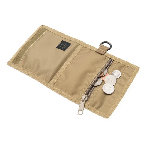 The MIS Folding Wallet in Coyote Tan is open, displaying a zippered coin pocket with coins inside, an empty pocket, and a black loop on the edge.