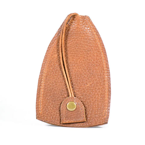 The Rogue Industries Rogue Leather Key Protective Case is a brown textured leather key holder with a rounded shape, drawstring closure, and brass button detail at the front, shown upright against a white background.
