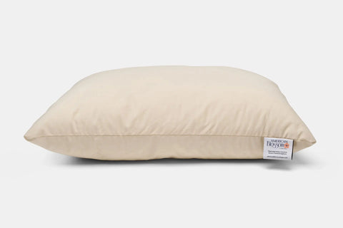 The Down Alternative Pillow With Recycled Polyester Fill by American Blossom Linens is a comfortable, rectangular beige pillow with a white brand tag, designed for restful sleep and shown on a white background.