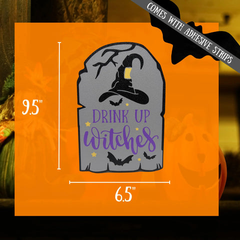 The Chatelet Manufacturing Halloween Drink Up Witches wall sign (9.5 x 6.5) features a witch hat, bats, and purple/yellow text on a gray tombstone shape. Perfect for parties; includes adhesive strips. Made in the USA.