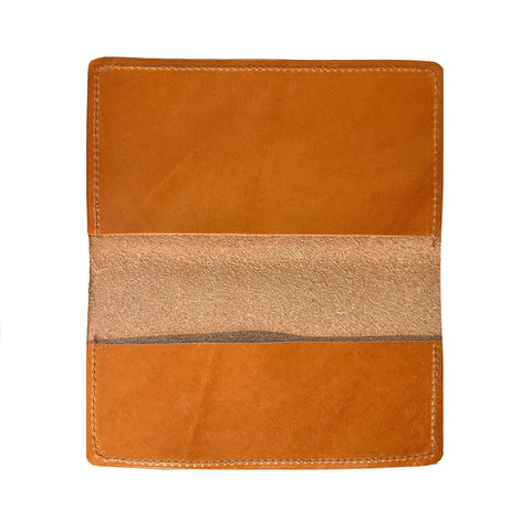 A Rogue Industries Leather Checkbook Cover in brown American Bison leather is displayed open on a white background, showing two interior pockets and detailed edge stitching.