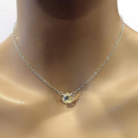 The Sterling Silver Wire Wrapped Crystal Briolette Drop Necklace by Alexa Martha Designs is displayed on a mannequin bust—an elegant choice for bridesmaid jewelry.