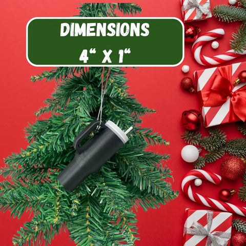 A Tumbler Cup Replica Christmas Ornament by Chatelet Manufacturing hangs on a tree with candy canes and gifts. Text above: DIMENSIONS 4 X 1. The perfect unique decoration for your tree! Made in USA. 2023 popular water bottle replica ornament.