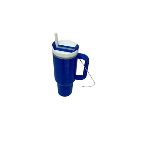The Chatelet Manufacturing Tumbler Cup Replica Christmas Ornament (2023) is a blue plastic cup with a handle, white lid, straw, and metal chain for hanging—perfect holiday décor made in the USA. Product is shown on a white background.