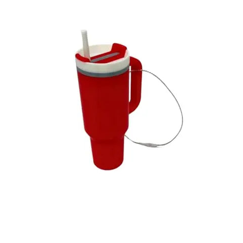 A large red Chatelet Manufacturing Tumbler Cup Replica Christmas Ornament with white lid, straw, handle, and metal lanyard. Features a 2023 popular water bottle design. Made in USA. Shown on a plain white background.
