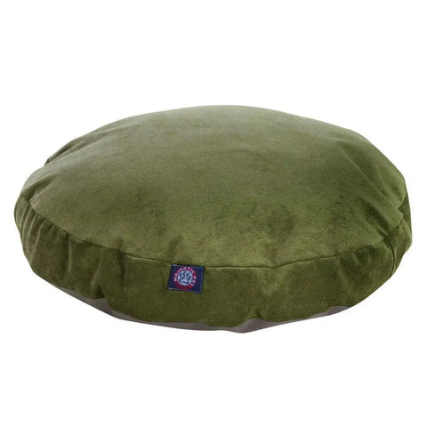 The Majestic Pet Villa Round Dog Bed features an olive green, velvety soft texture with a removable, washable cover and a small sewn label with a circular logo on the side.