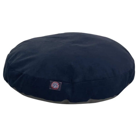 The Villa Round Dog Bed by Majestic Pet is a navy blue, plush bed with a removable cover and a small logo patch on the side, shown on a white background.