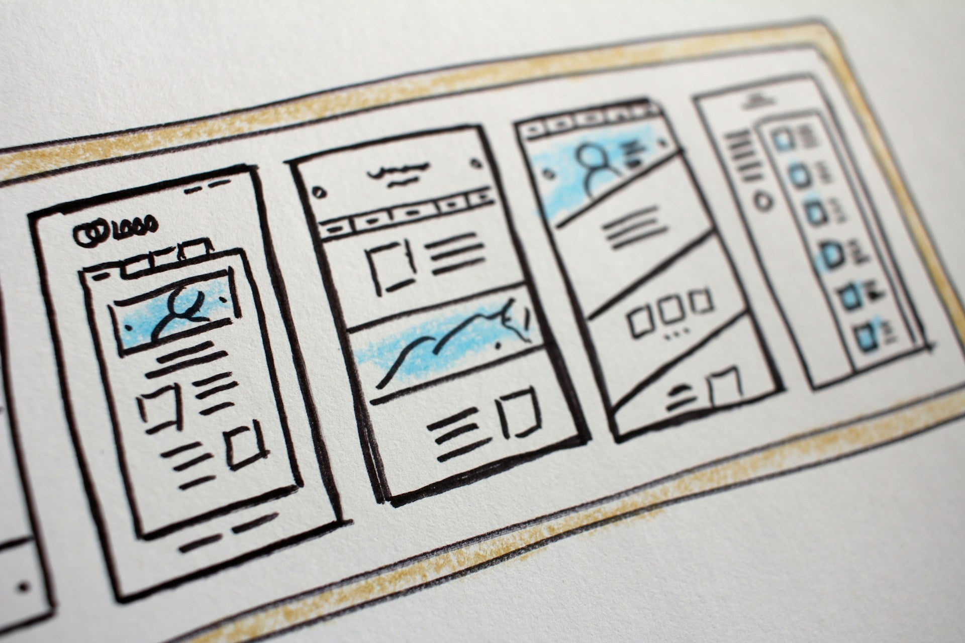 Wireframe design of a user interface with multiple screens on a white background